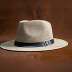 Sombrero de ala ancha en lino con detalle en cuero