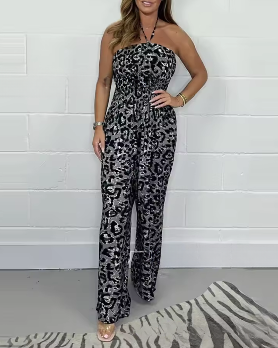 Mono estampado sin tirantes con escote halter y perneras anchas®