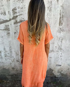 Vestido midi de algodón y lino con escote en V®