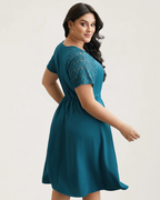 Vestido con bolsillos y mangas cortas con aberturas de encaje®